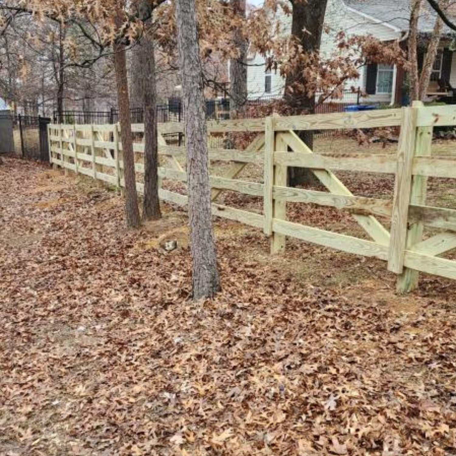 split rail wood fence near home