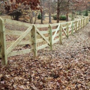 split rail wood fence down hill